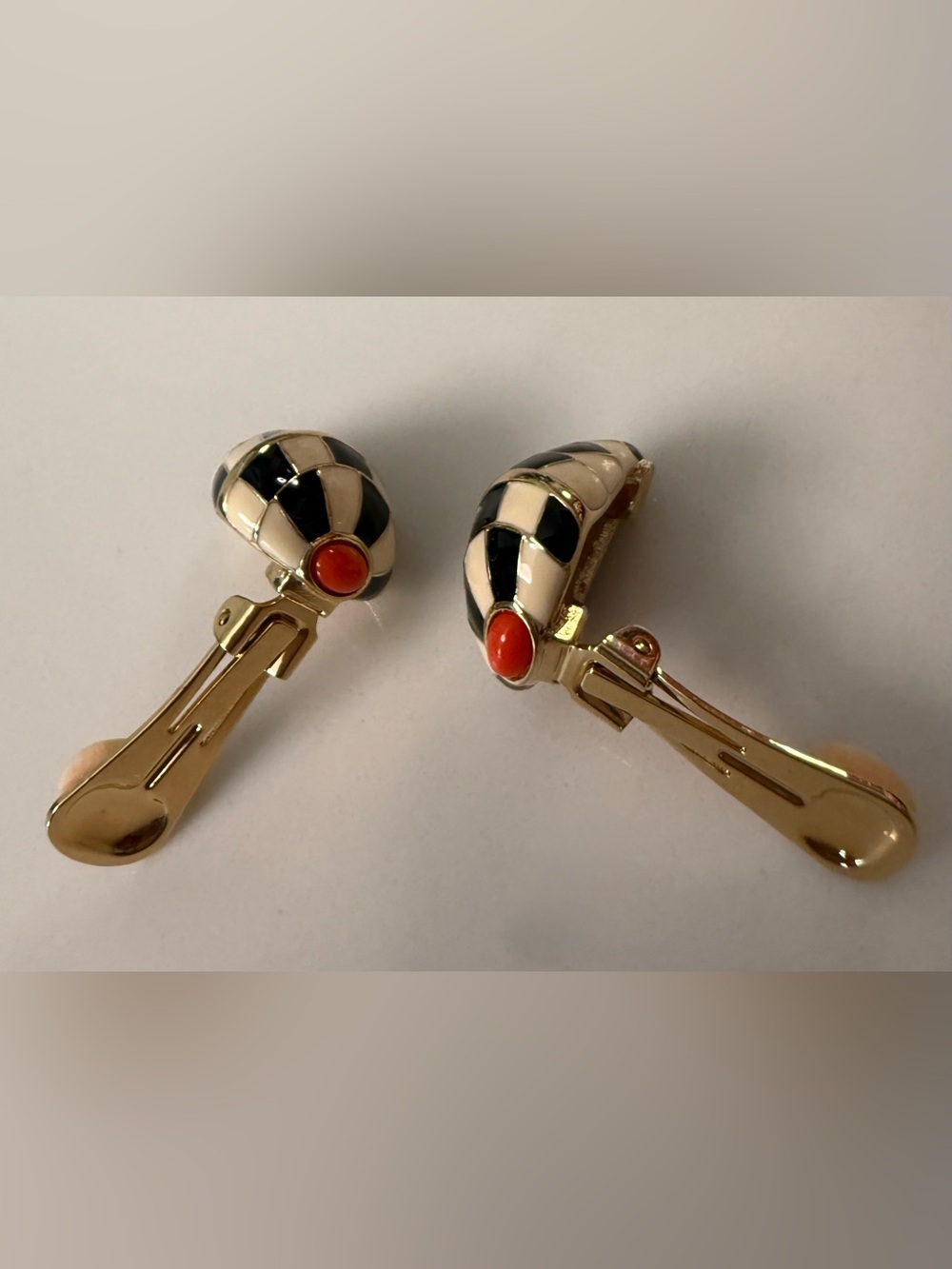 Kenneth Jay Lane  black & white checkerboard enamel, conch-shell-like earrings. - Picture 3 of 4
